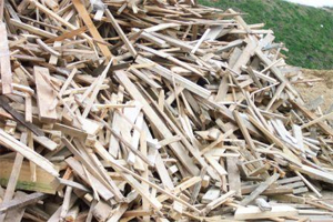 Piles of wood scraps. Mike & Dad's Hauling provides contractor clean up services in Portland OR and Vancouver WA.