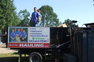 Mike & Dad's Hauling crew loading truck