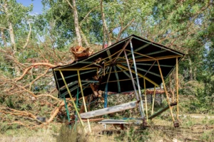 broken down gazebo in a back yard