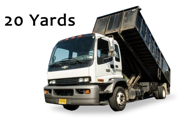 A white commercial cab-over dump truck with its large black dump bed raised for Mike & Dad's Hauling's 21 Yard Truck Loads.